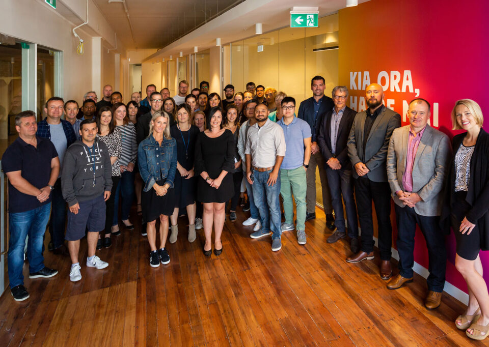 N4L staff at the blessing of our office space in the Textile building, led by Graham Tipene from Ngāti Whātua-o-Ōrākei