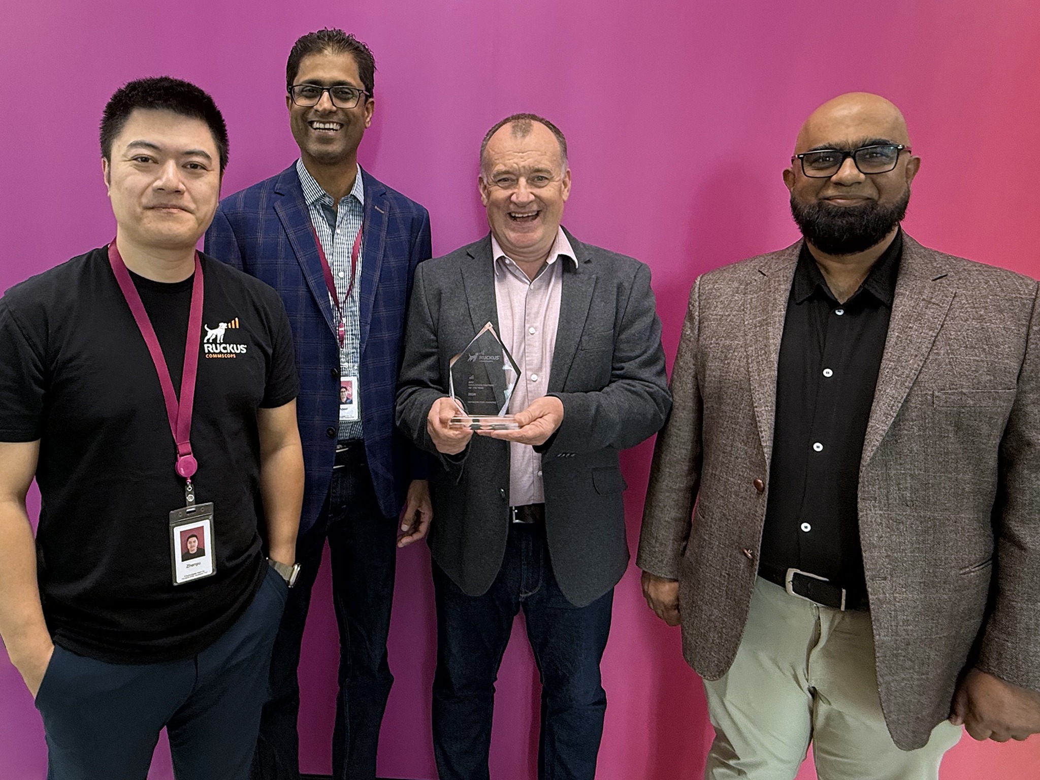 N4L team members posing with award trophy